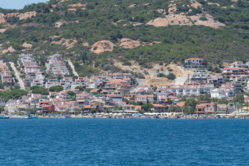 Fototapeta na wymiar Looking at view of Yenifoca waterfront. Yenifoca is a town and district in Turkey's Izmir Province on the Aegean coast.