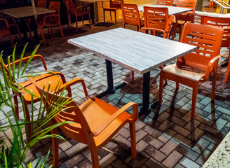 Outdoor Patio Seating Orange Patio Chairs of a Restaurant