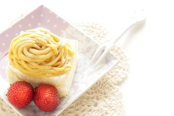 Marron short cake on dish with copy space