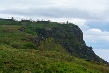 Fototapeta na wymiar Viewpoint at Lealt Gorge and the edge of a cliff , Isle of Skye , Scotland
