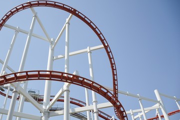 Roller coaster twisting rail track structure in the park