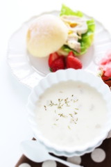 Homemade mushroom soup on white background