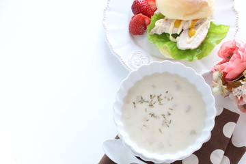 Homemade mushroom soup on white background
