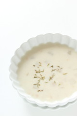 Homemade mushroom soup on white background