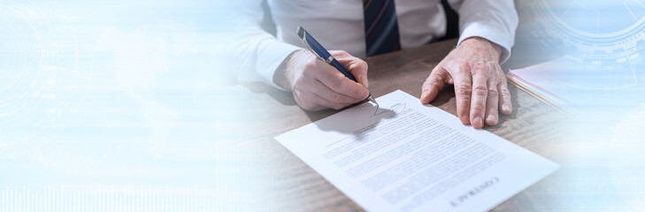 Businessman signing a document; panoramic banner