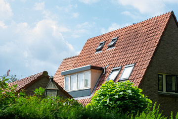 Fototapeta na wymiar Dutch roof typical Dutch residential area