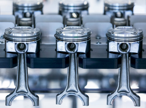 New pistons on the rack at automobile assembly line production plant