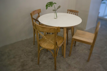 Cozy coffee shop with wooden furniture set