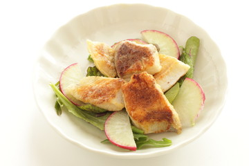 Freshness pan fried yellowtail fish Japanese radish on white background