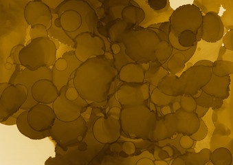 Hand painted gold alcohol ink background. Abstract delicate yellow texture. Contemporary wallpaper. 