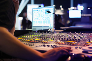 close ups on sound engineer with studio sound and visual mixer used for media and events directing...