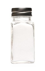 Salt in glass holder, cellar isolated on white background