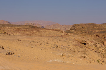 Fototapeta na wymiar Coloured Canyon is a rock formation on South Sinai (Egypt) peninsula. Desert rocks of multicolored sandstone background. 