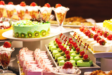 Showcase with  many cakes, traditional food.