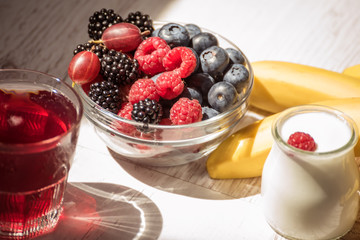 Different berries and yogurt. The right healthy food
