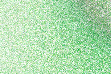 Fototapeta premium Abstract beautiful background of green sparkles for festive design