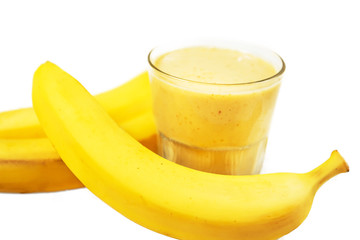 Bananas and a natural banana drink. Isolate on white background