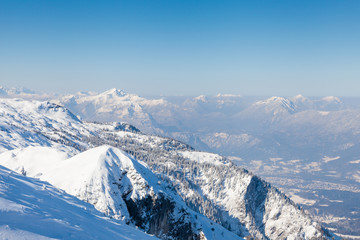 The view from the summit of Untersberg mountain in Austria. Untersberg straddles the German border and two mountains, Zwiesel in Bavaria, Germany and Staufen in Austria can be seen in the background.