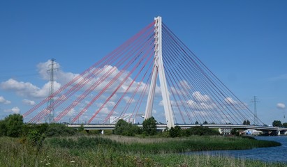 Cable-stayed bridge on the Vistula river. Cars passing the bridge. Gdansk/Poland
