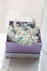 box with jewelry, jewelry in the form of pearl beads
