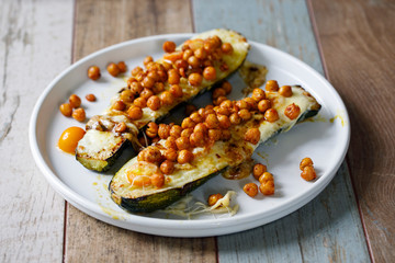 Baked courgette with cheese and crispy spicy chickpeas