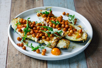 Baked courgette with cheese and crispy spicy chickpeas