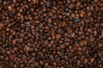 Fototapeta premium top view of delicious fresh textured coffee grains