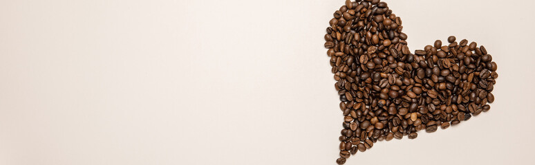 top view of heart made of grains on beige background, panoramic shot
