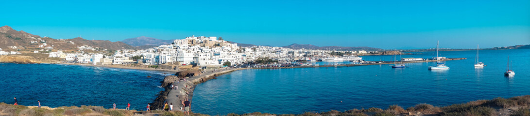 2 men playing bouzouki surrounded by the beauty of the island of Naxos