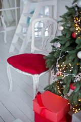 vintage chair near Christmas tree