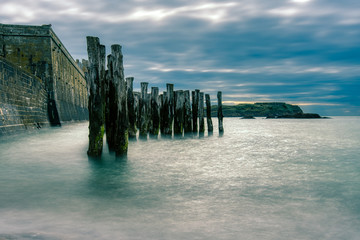 Quay wall in the waves of St. Malo