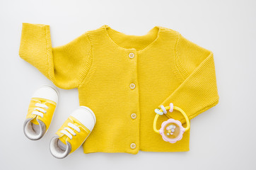 Top view yellow sweater with shoes