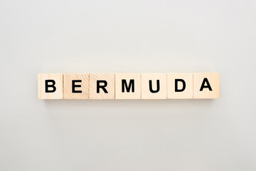 top view of wooden blocks with Bermuda lettering on white background