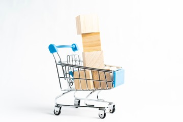 Mini shopping trolley isolated against white background