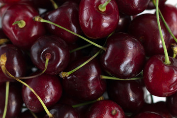 fresh red cherries in a bowl. cherries as background