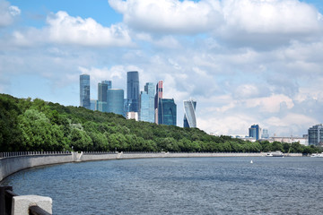 Obraz premium Moscow, Russia - July 8, 2019: The view of the Moscow International Business Center skyscrapers and cloudy sky from the Vorobyevskaya embankment