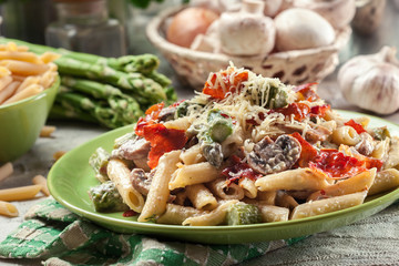 Penne pasta with asparagus and mushroom