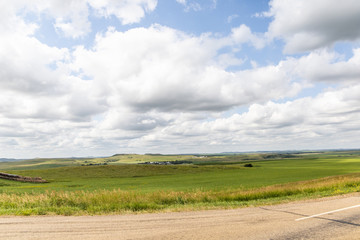 Fototapeta na wymiar rural north dakota farm fields against a blue sky