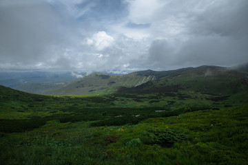 rain high in the mountains floods half the panorama of the mountains