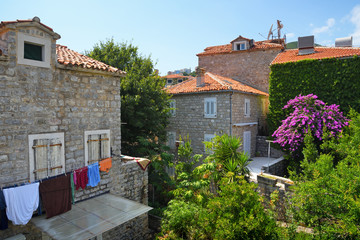 Fototapeta na wymiar Houses and courtyards in old town of Budva, Montenegro