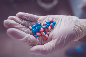 Doctor giving you a colorful pills 