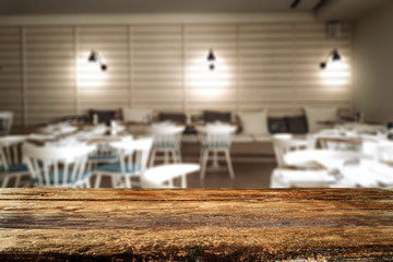 Desk of free space and blurred background bar 