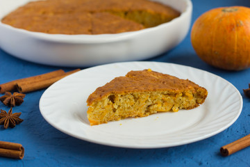 delicious fresh homemade pumpkin pie on blue background