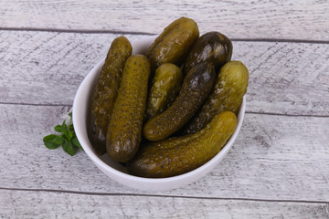 Pickled cucumbers heap in the bowl