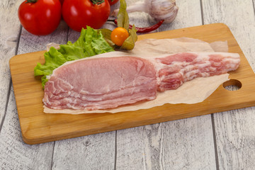 Raw pork bacon