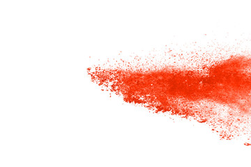 abstract orange powder splatted background,Freeze motion of color powder exploding/throwing color powder,color glitter texture on white background.