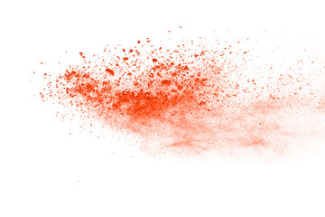 abstract orange powder splatted background,Freeze motion of color powder exploding/throwing color powder,color glitter texture on white background.