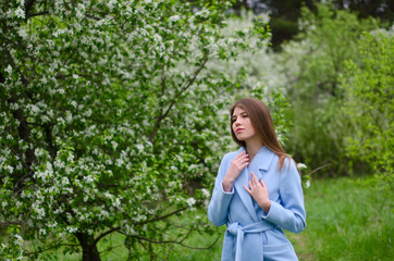 beautiful girl in a blooming Park