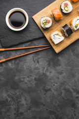 Fototapeta premium Flat lay sushi arrangement with copy space
