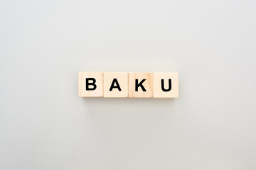 top view of wooden blocks with Baku lettering on grey background
